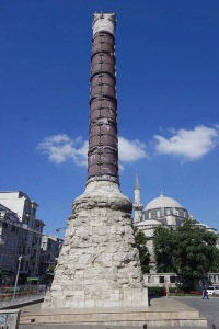 Column of Constantine, in the centre of the Forum of Constantine, made of porphyry blocks, dedicated by Constantine the Great on 11 May 330 AD to mark the declaration of Nova Roma as capital of the Roman Empire. Image: Bollweevil, Wikipedia 3 August 2010